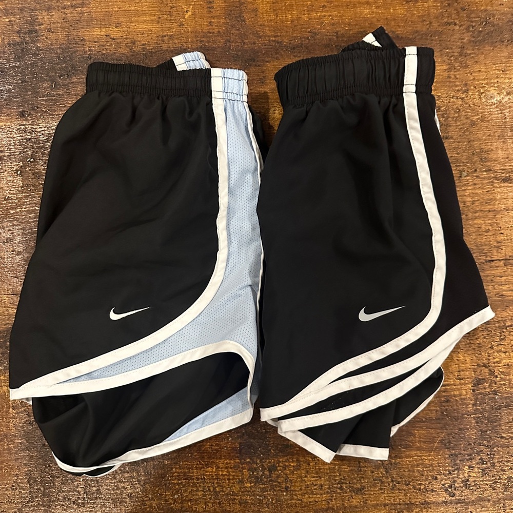 2 nike shorts, 1 black, 1 black with blue!!